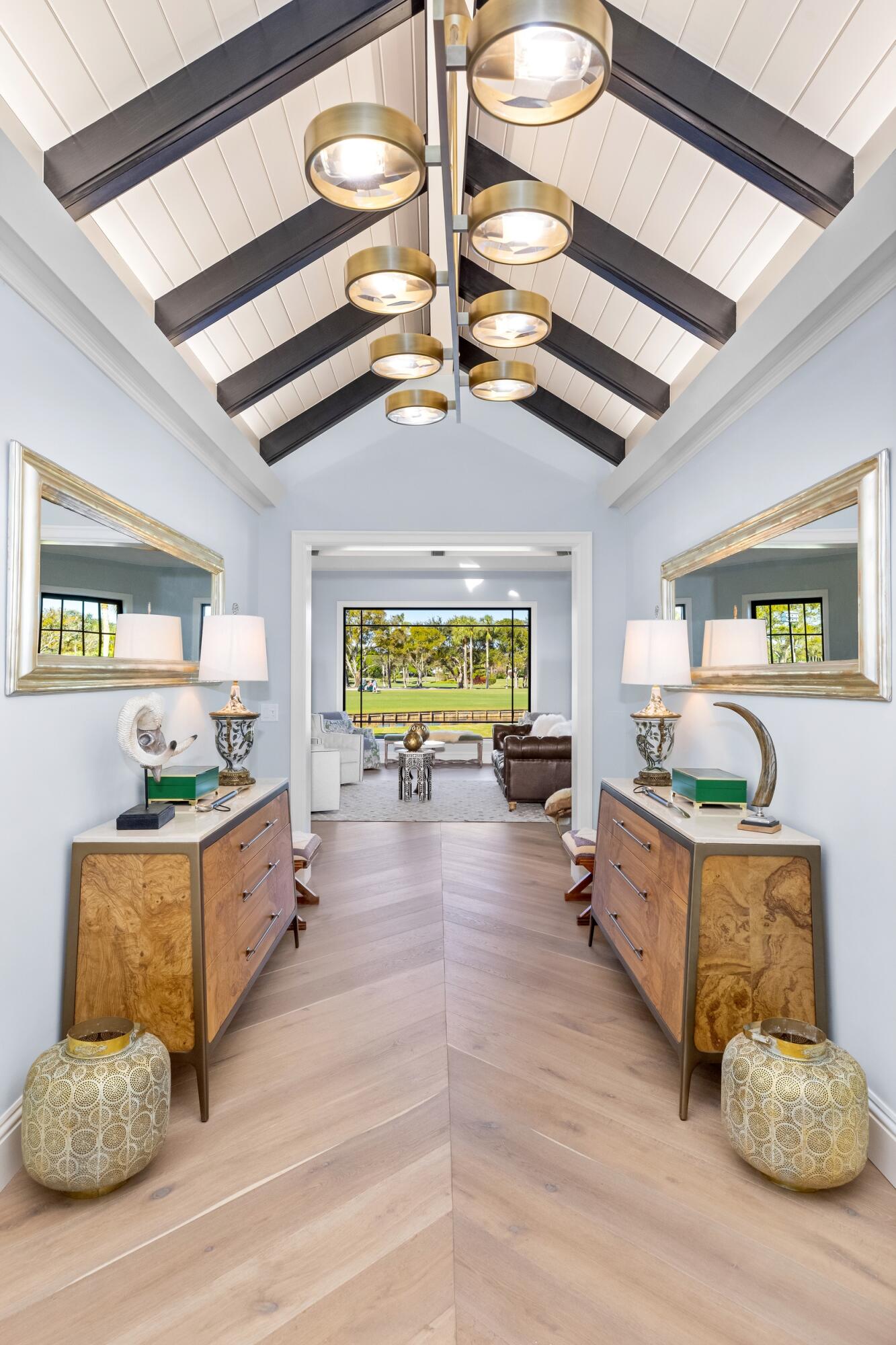 39 Country Road South Boynton Beach, FL 33436 - Photo 7 of 55 a room with fireplace furniture and a large window