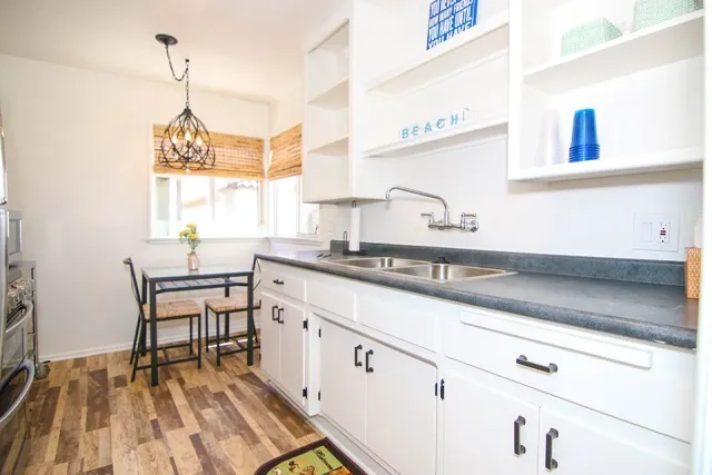 a kitchen with a stove and a microwave