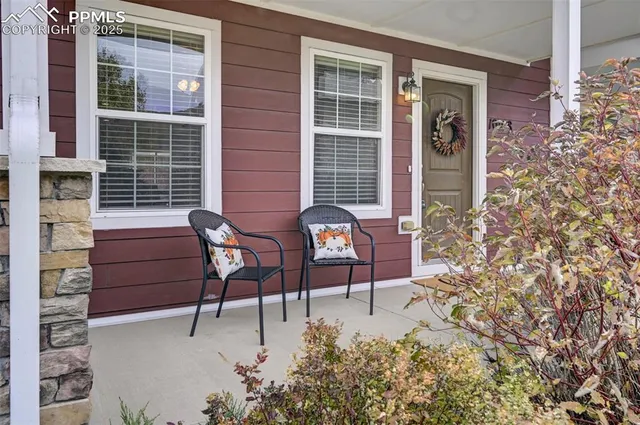 a bench sitting in front of a building