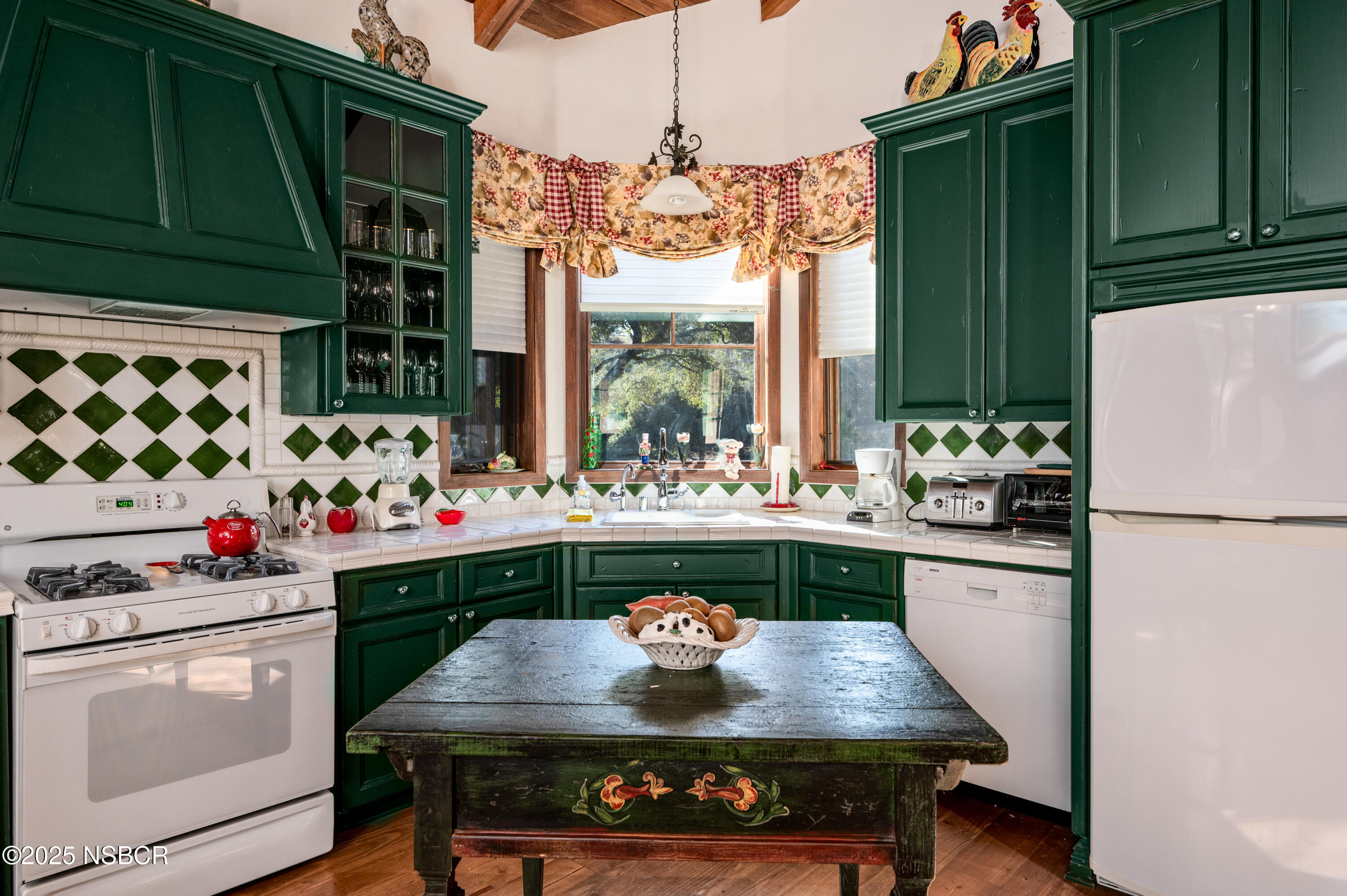 4086 East Oak Trail Road Santa Ynez, CA 93460 - Photo 32 of 57 a kitchen with stainless steel appliances granite countertop a stove a refrigerator and a kitchen island
