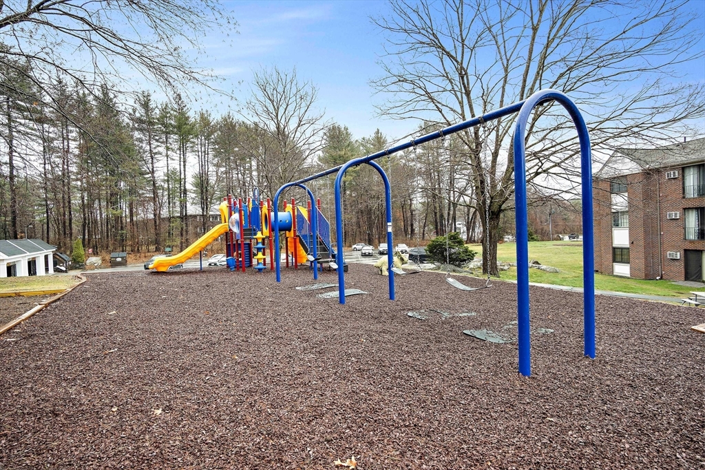 386 Great Road, Unit A8 Acton, MA 01720 - Photo 25 of 26 a view of park with slide