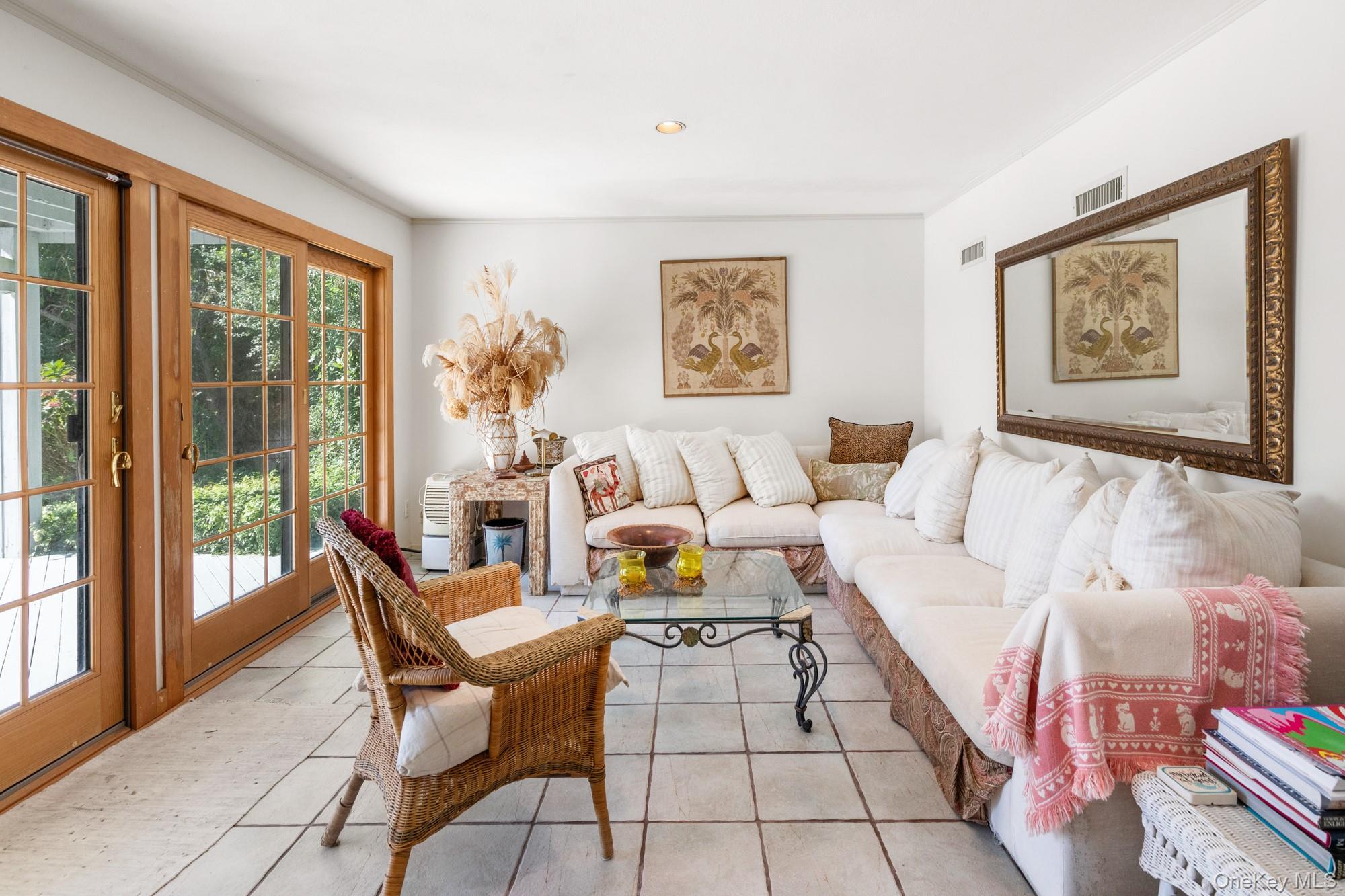 29 Kenwood Road Southampton, NY 11968 - Photo 21 of 35 a living room with furniture and a large window with outer view