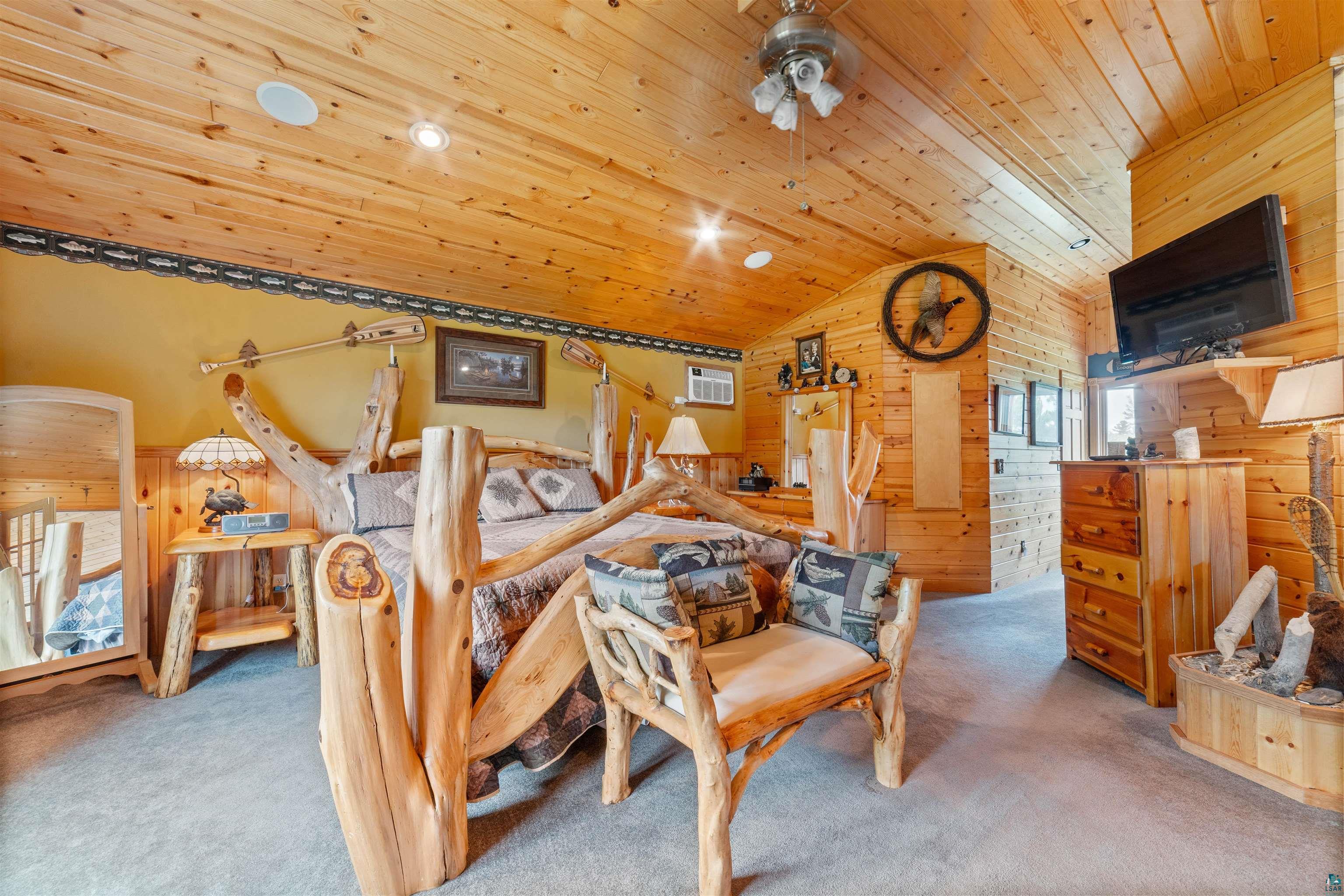 11911 East Rowe Road Lake Nebagamon, WI 54849 - Photo 40 of 61 Vaulted wood-paneled ceiling with recessed lighting and a ceiling fan