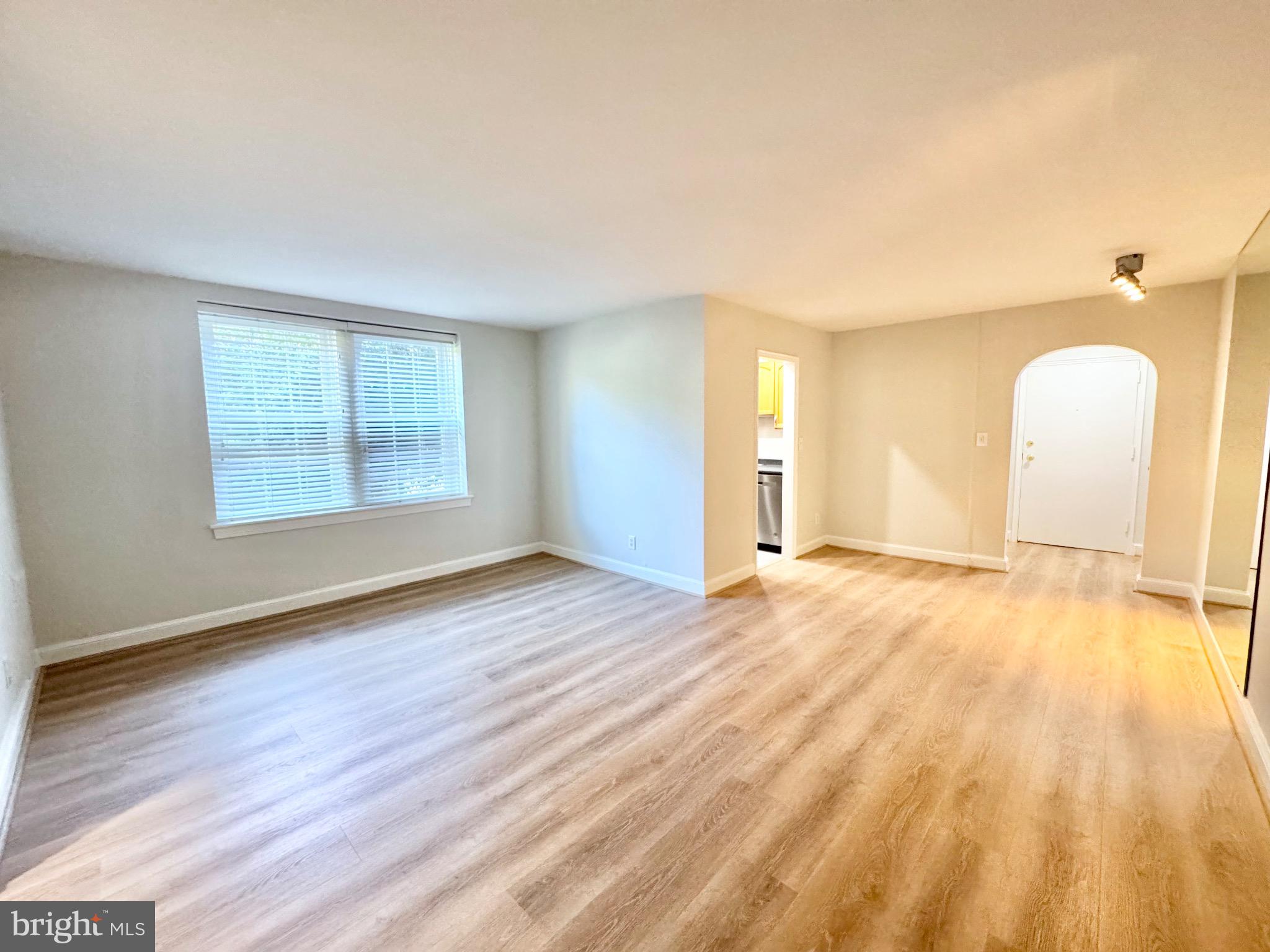 22 South Old Glebe Road, Unit 106D Arlington, VA 22204 - Photo 1 of 19 Bright and airy open living space.