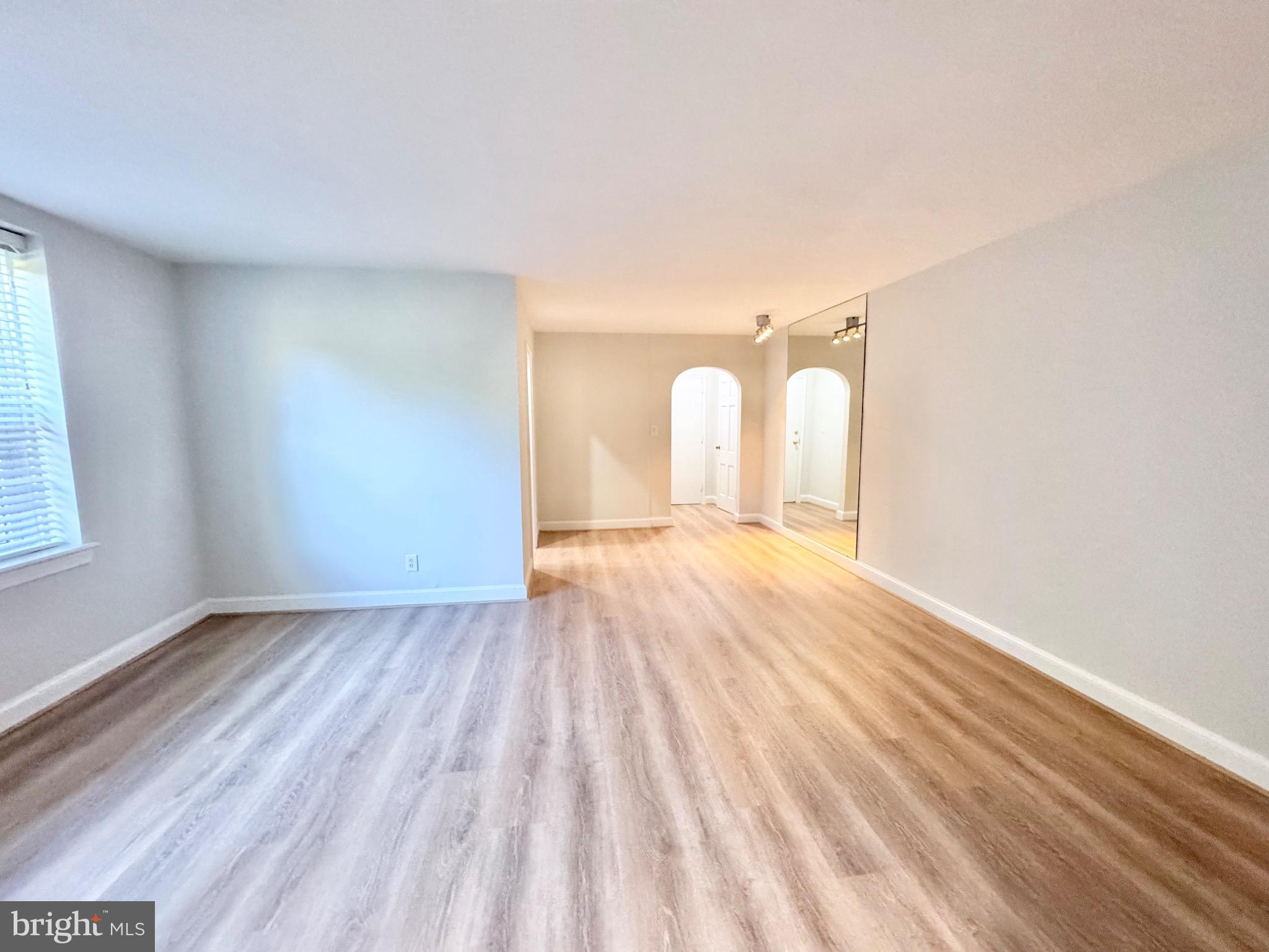 22 South Old Glebe Road, Unit 106D Arlington, VA 22204 - Photo 11 of 19 Spacious, light-filled living area awaits you.