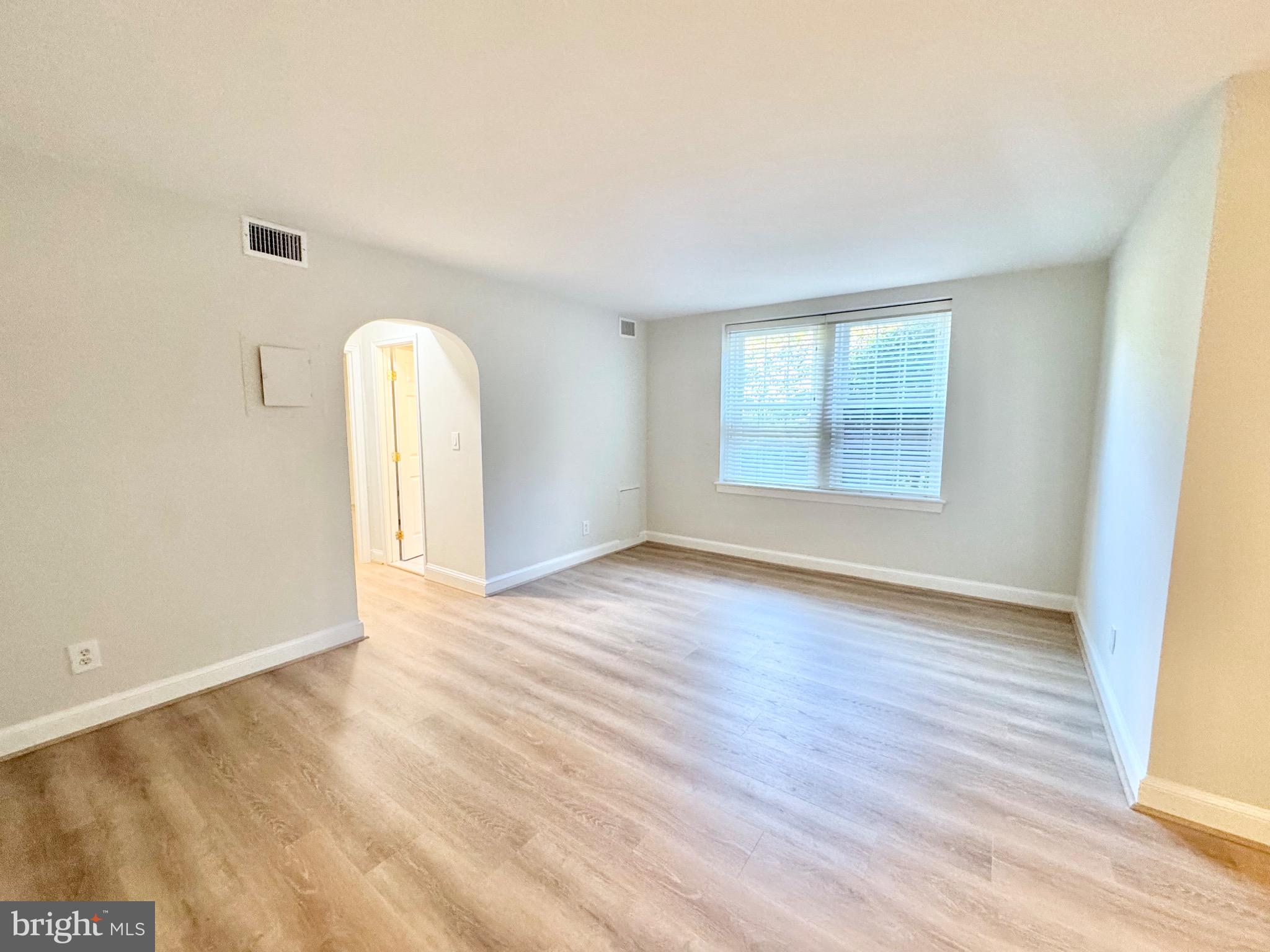 22 South Old Glebe Road, Unit 106D Arlington, VA 22204 - Photo 9 of 19 Bright and airy living space with natural light.