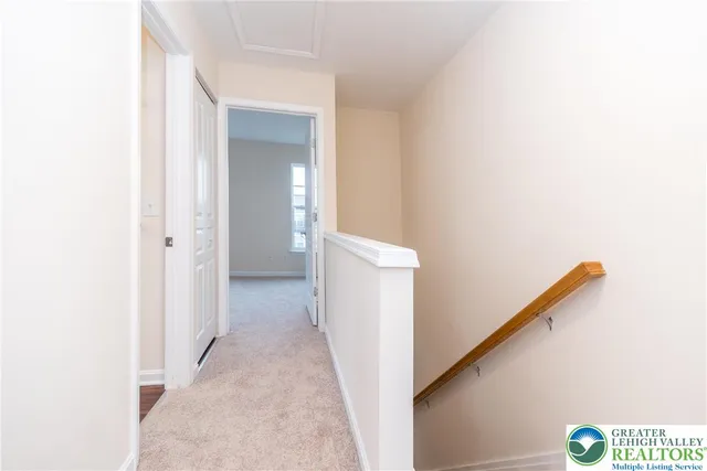 a view of hallway with stairs