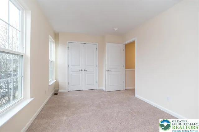 a view of an empty room and window