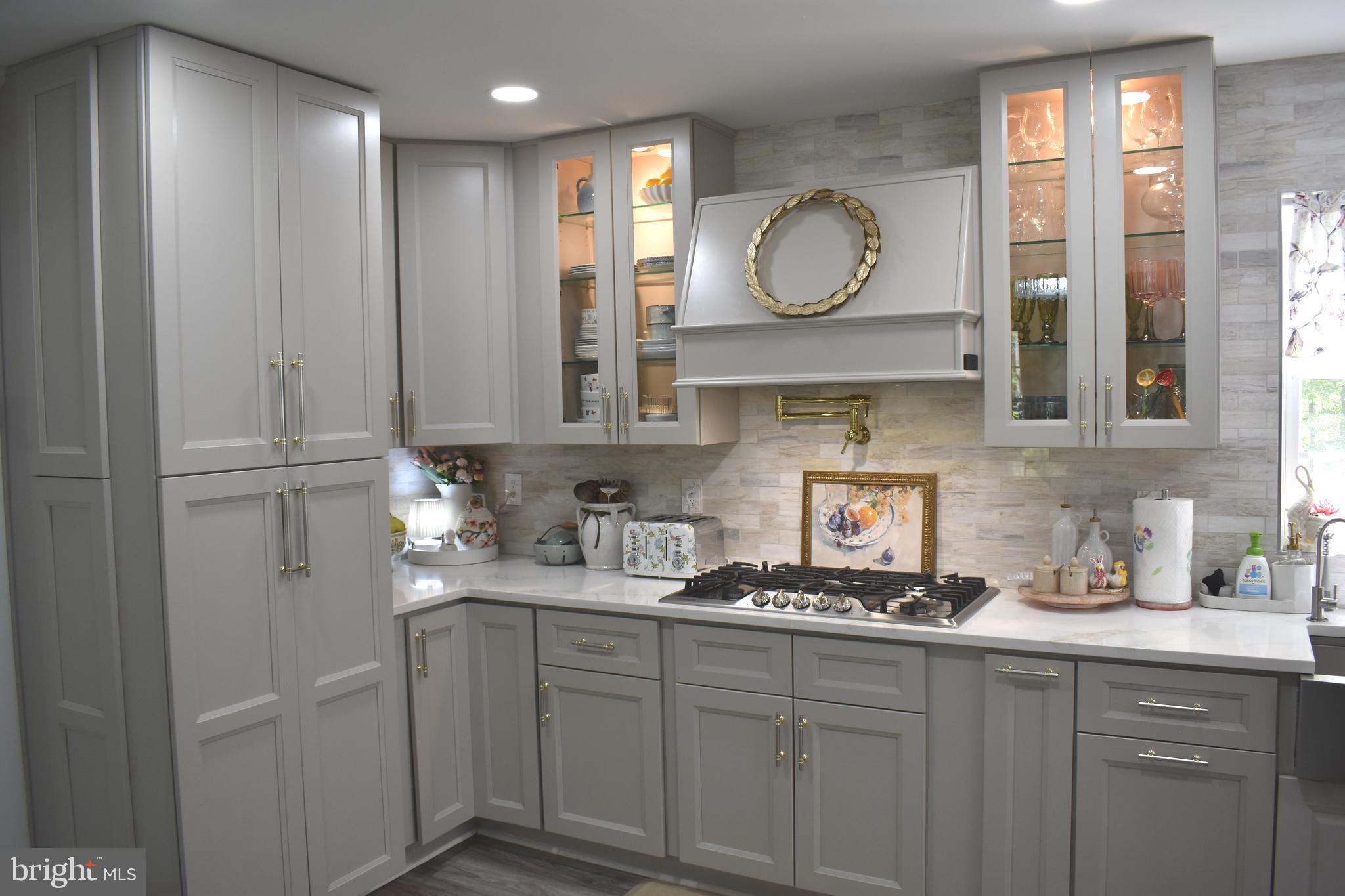 10958 Mountain Run Lake Road Culpeper, VA 22701 - Photo 6 of 31 a kitchen with cabinets and window