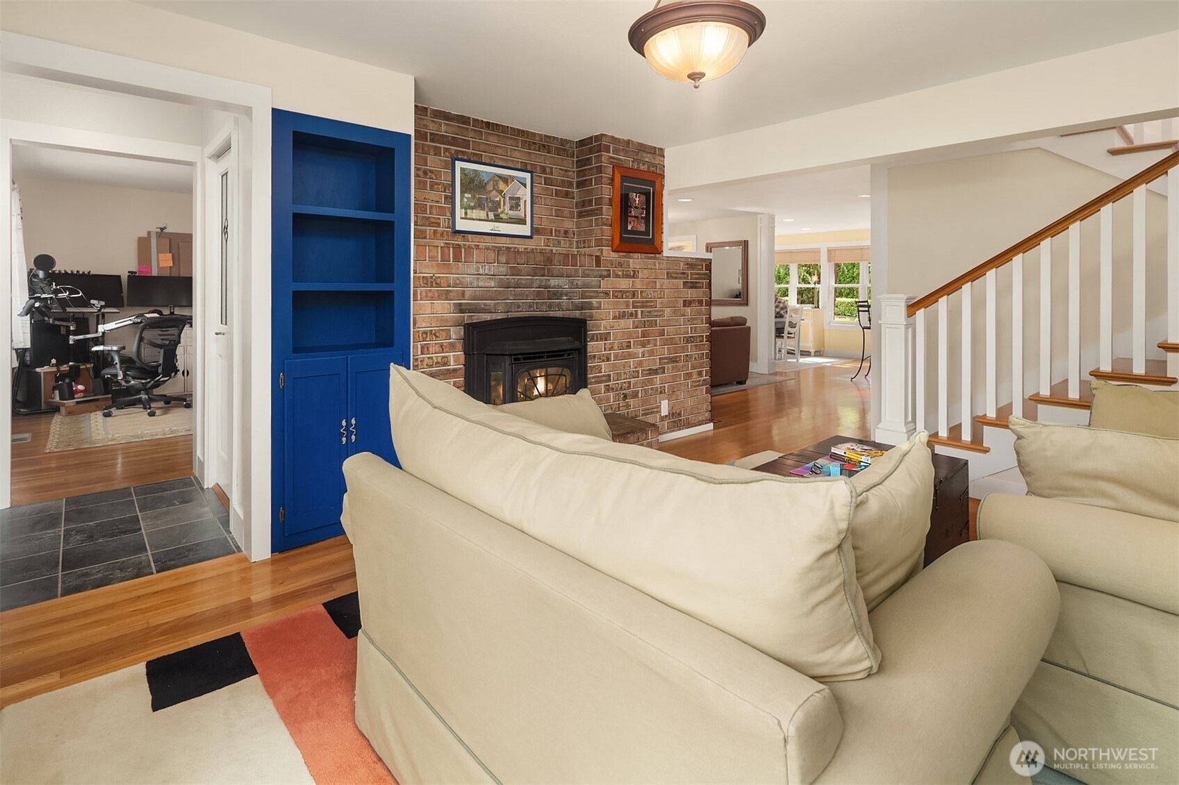7732 195th Street Southwest Edmonds, WA 98026 - Photo 11 of 39 a living room with furniture and a fireplace