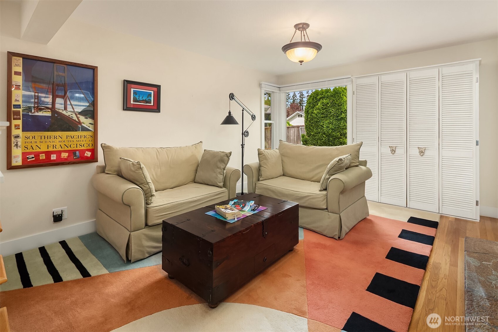 7732 195th Street Southwest Edmonds, WA 98026 - Photo 12 of 39 a living room with furniture a rug and a window