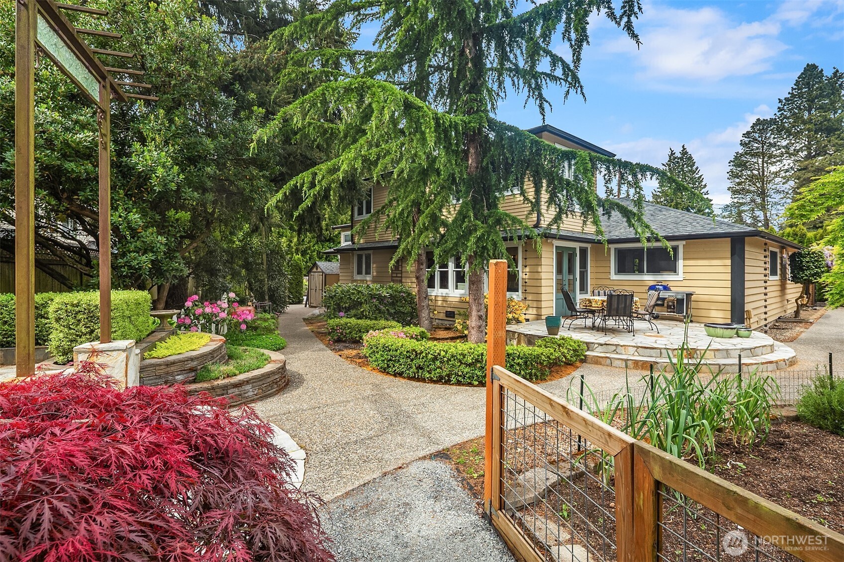 7732 195th Street Southwest Edmonds, WA 98026 - Photo 2 of 39 a view of a house with swimming pool and garden