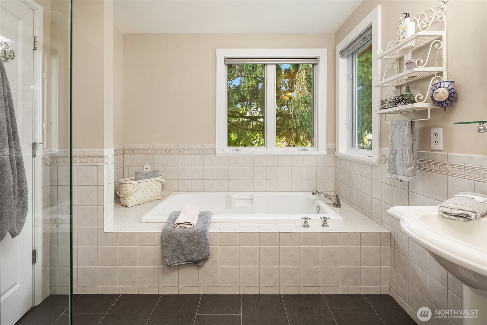 7732 195th Street Southwest Edmonds, WA 98026 - Photo 23 of 39 a bathroom with a bathtub and shower