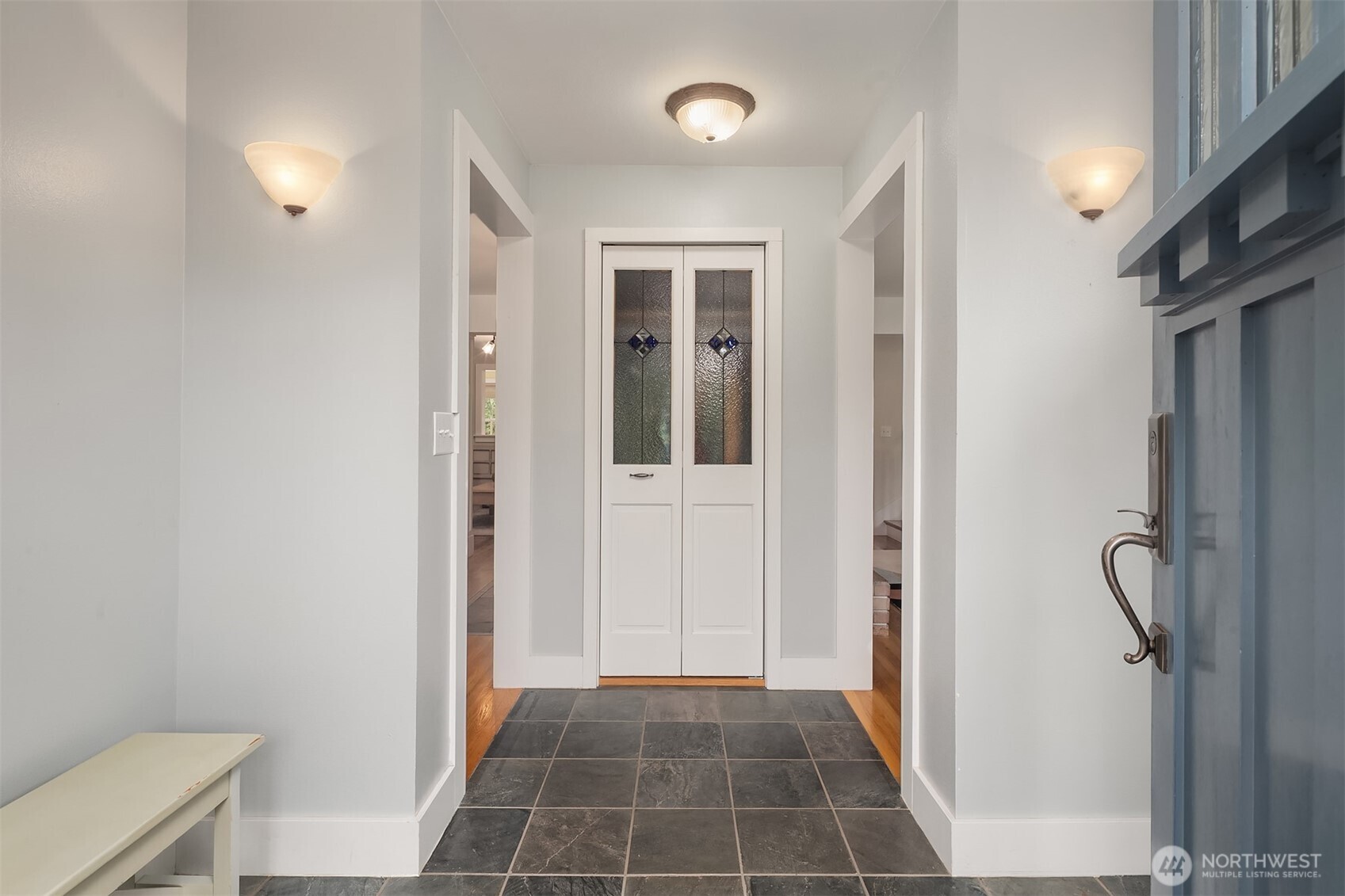 7732 195th Street Southwest Edmonds, WA 98026 - Photo 3 of 39 a view of a hallway to rooms