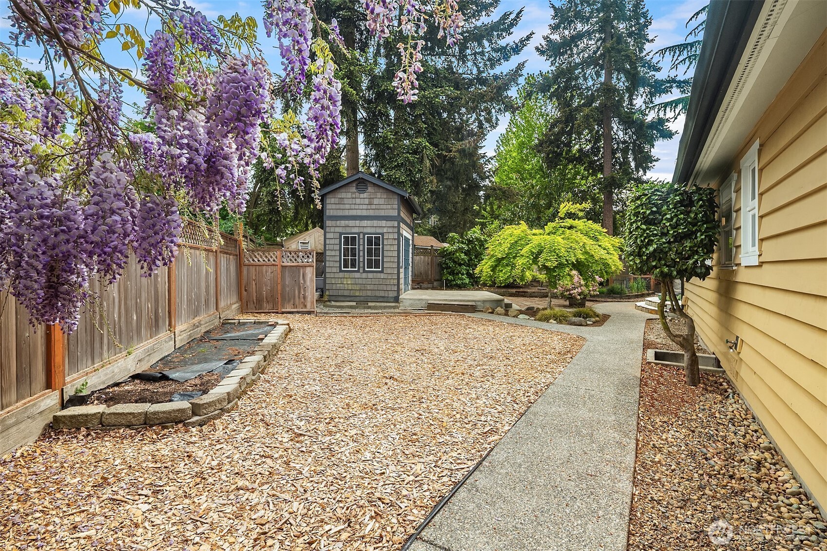7732 195th Street Southwest Edmonds, WA 98026 - Photo 31 of 39 a view of a pathway with a house