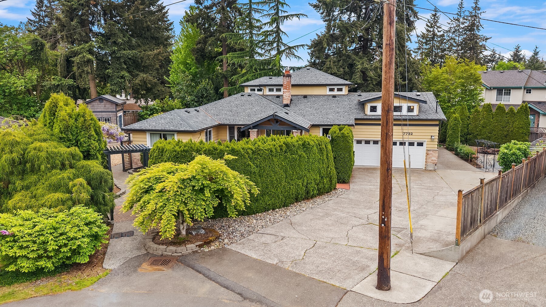 7732 195th Street Southwest Edmonds, WA 98026 - Photo 38 of 39 a front view of a house with garden