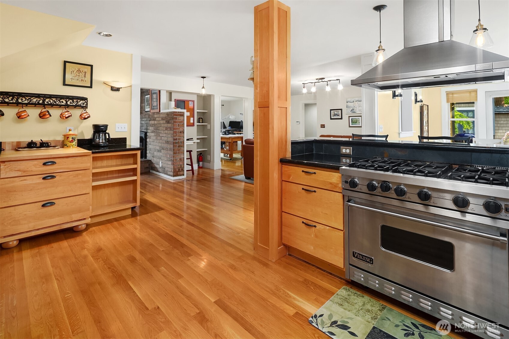 7732 195th Street Southwest Edmonds, WA 98026 - Photo 7 of 39 a kitchen with stainless steel appliances granite countertop a stove and a wooden floors