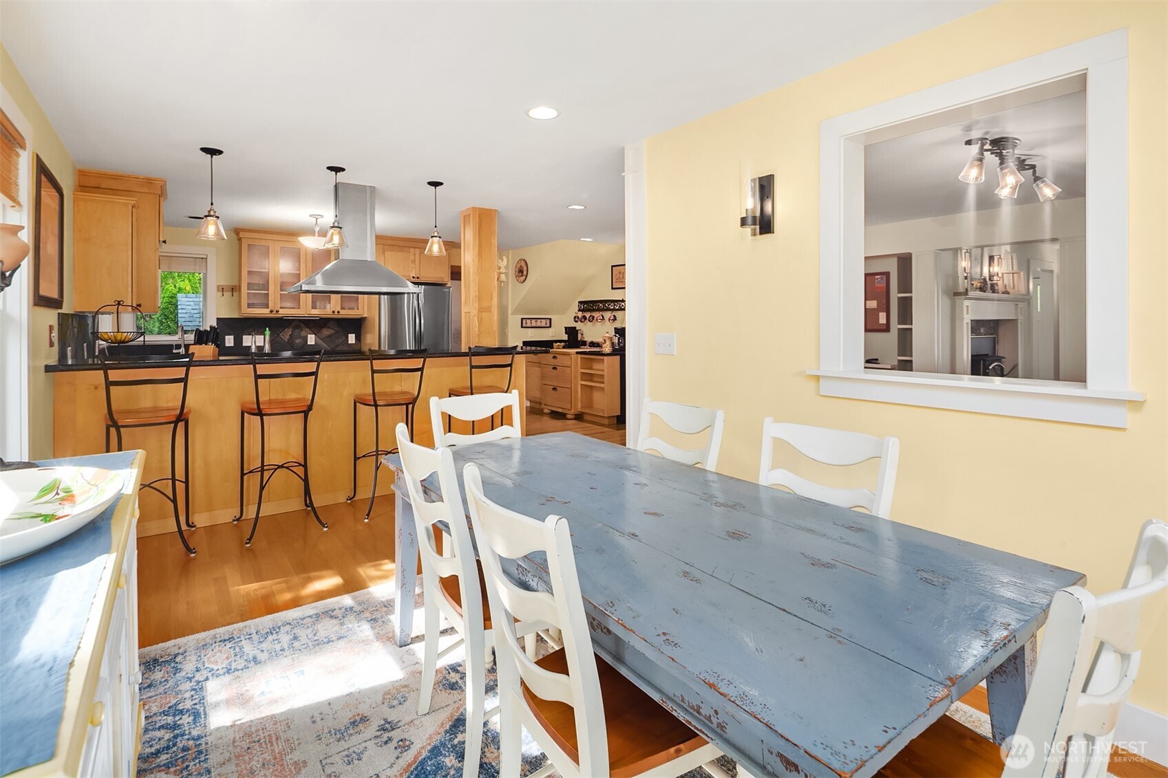 7732 195th Street Southwest Edmonds, WA 98026 - Photo 9 of 39 a view of a dining room kitchen counter top and furniture