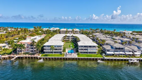 a view of a city with lawn chairs