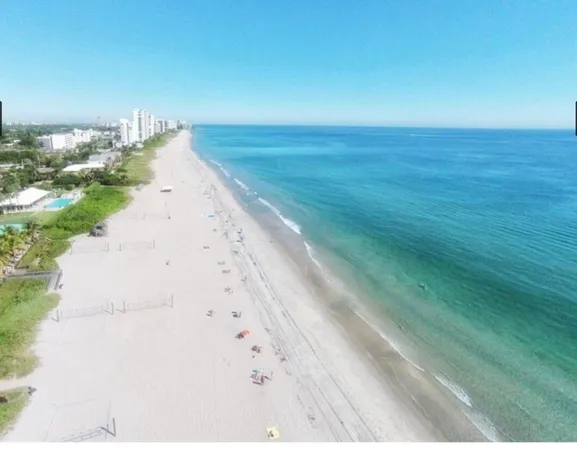 a view of beach and kitchen
