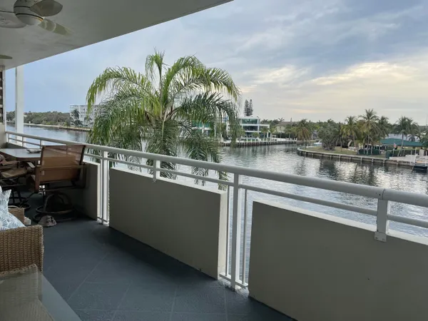 a view of a lake with a terrace