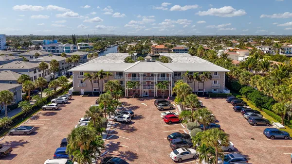 a view of a lot of flowers around a house