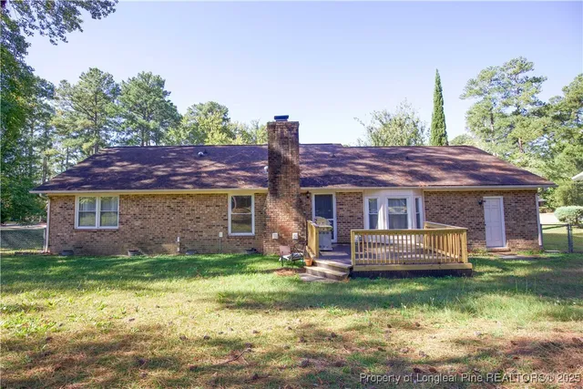 a view of swimming pool with an outdoor space and seating