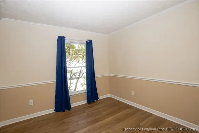 a kitchen with stainless steel appliances granite countertop a refrigerator a stove and a sink