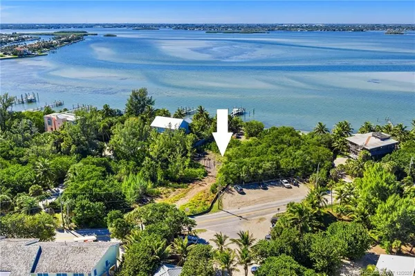 a view of a lake with a building in the background
