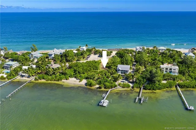 a picture of a yard with a lake view