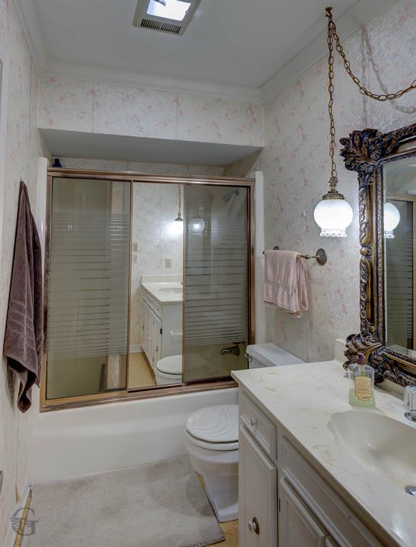 5516 Hickory Ridge Drive Bossier City, LA 71111 - Photo 22 of 33 a bathroom with a sink a toilet and shower