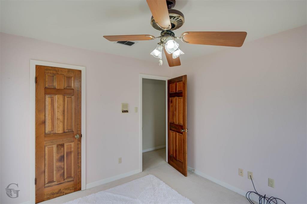 5516 Hickory Ridge Drive Bossier City, LA 71111 - Photo 28 of 33 wooden floor in an empty room with a mirror