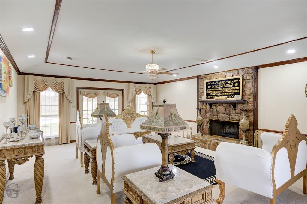 5516 Hickory Ridge Drive Bossier City, LA 71111 - Photo 5 of 33 a living room with furniture fireplace and flat screen tv
