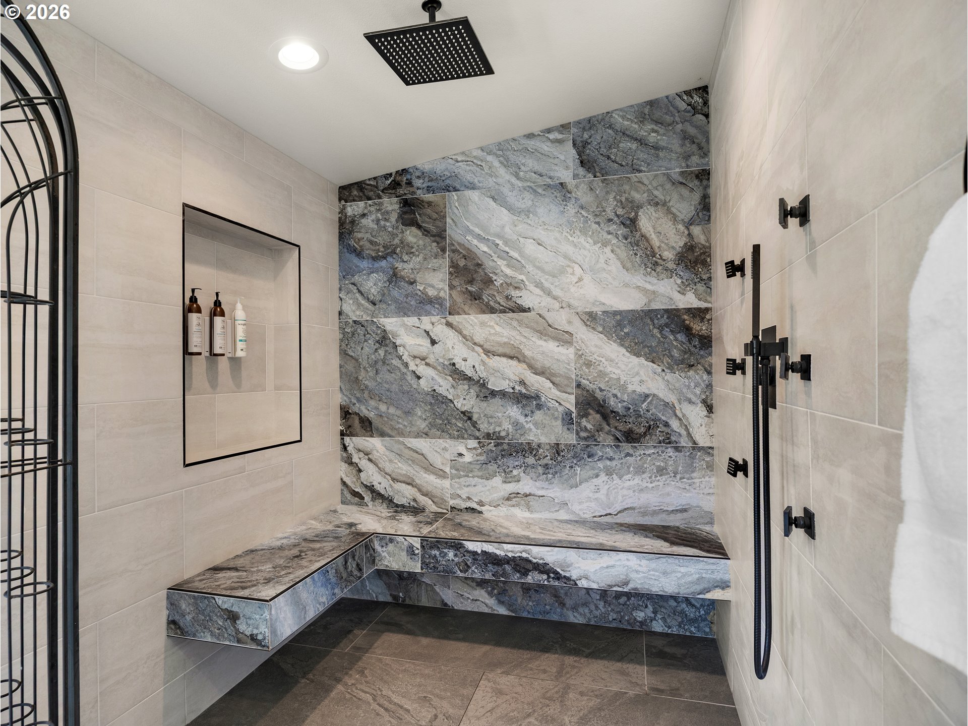 3232 Sunset Boulevard Seaside, OR 97138 - Photo 32 of 48 a spacious bathroom with a granite countertop sink a mirror and shower