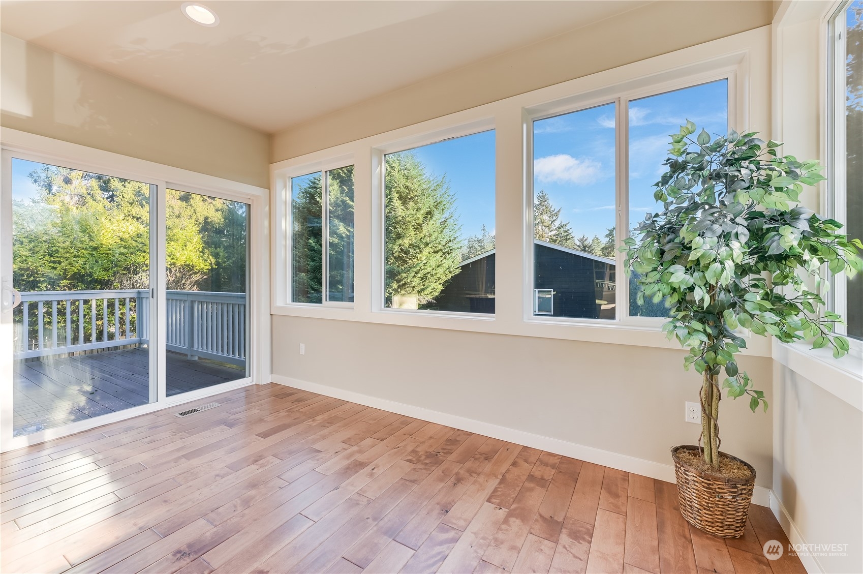10408 Southeast 13th Street Bellevue, WA 98004 - Photo 11 of 38 a view of livingroom with furniture window and wooden floor