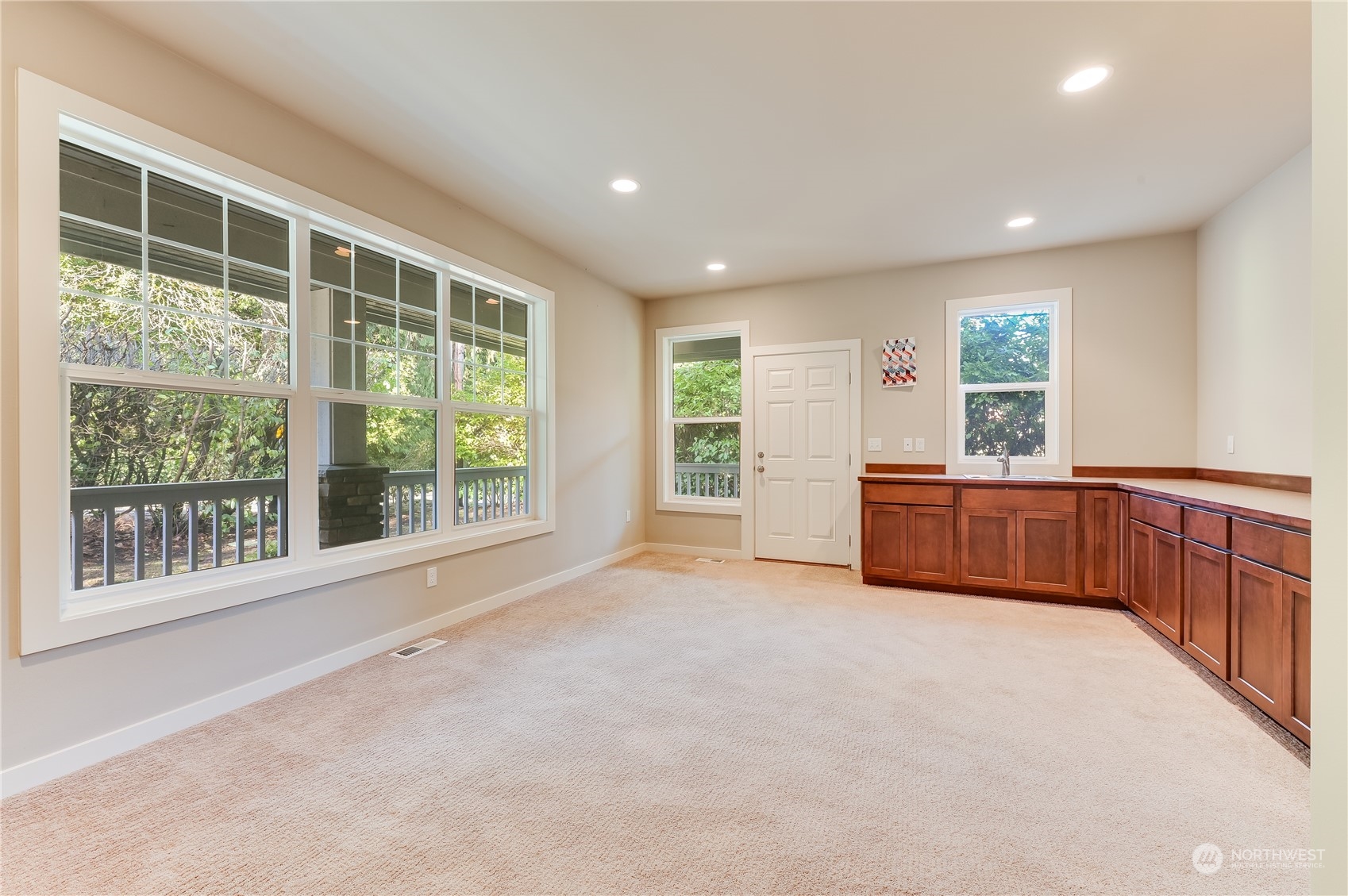 10408 Southeast 13th Street Bellevue, WA 98004 - Photo 18 of 38 a view of an empty room with a window and cabinet
