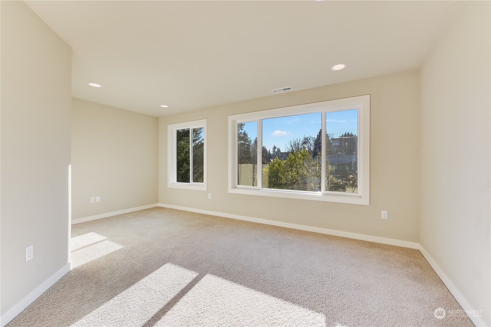 10408 Southeast 13th Street Bellevue, WA 98004 - Photo 21 of 38 a view of an empty room with a window
