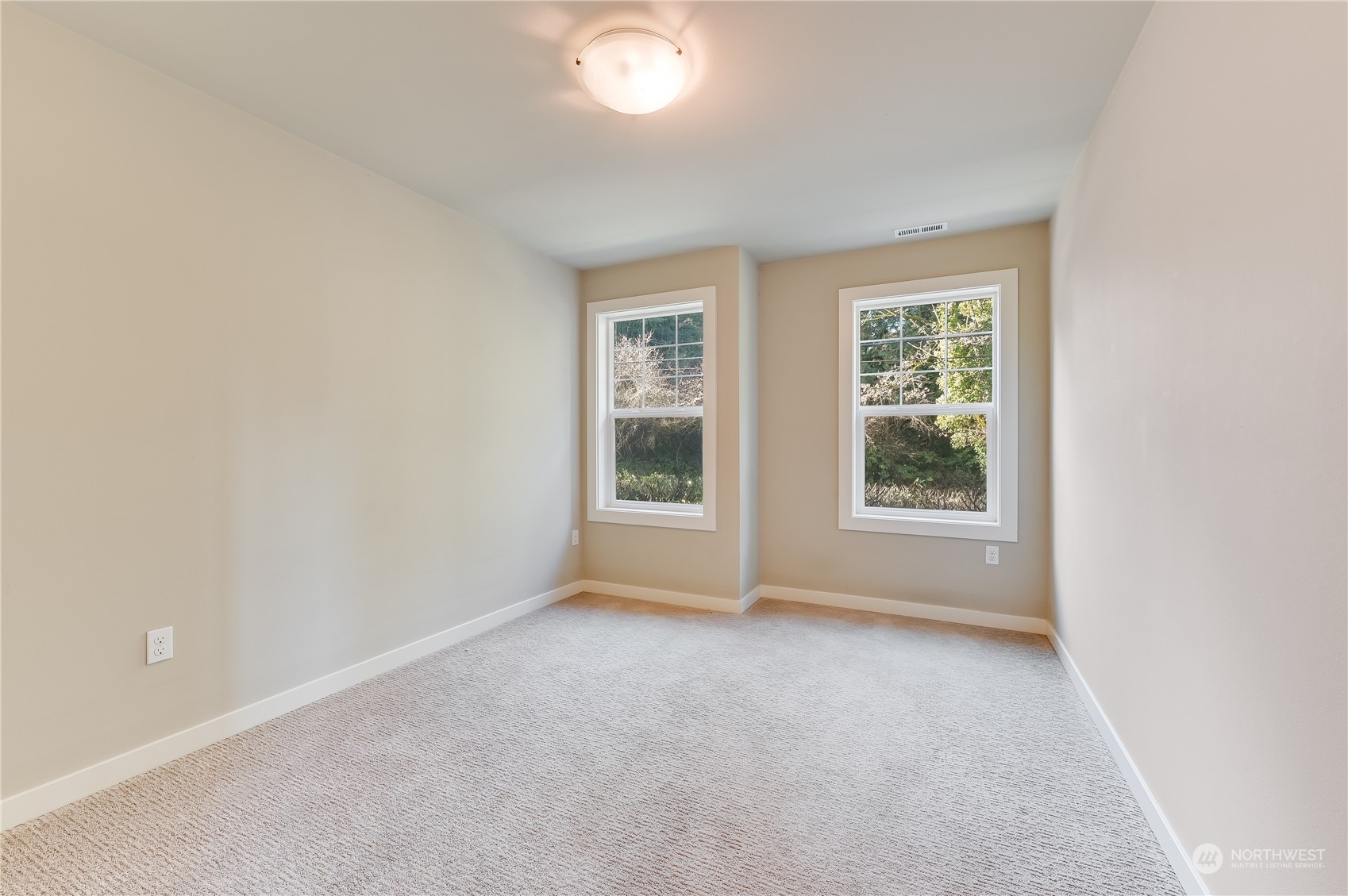 10408 Southeast 13th Street Bellevue, WA 98004 - Photo 27 of 38 an empty room with windows