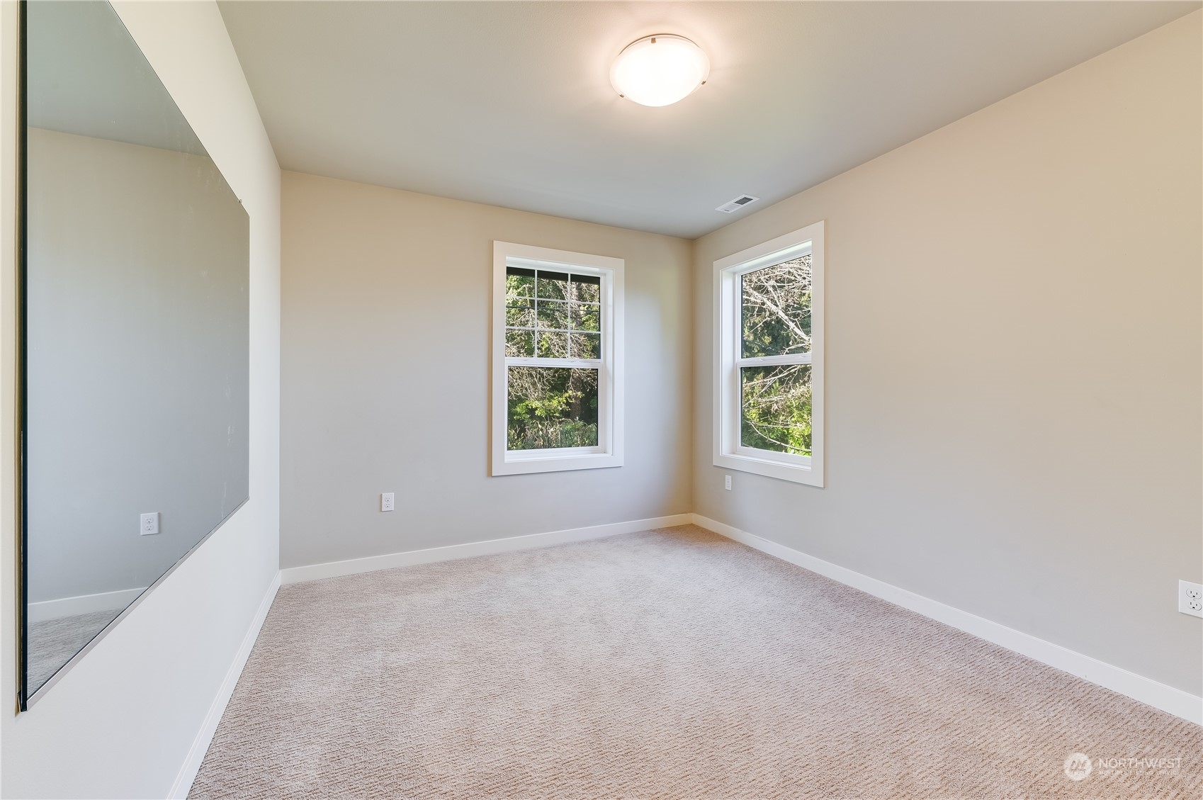 10408 Southeast 13th Street Bellevue, WA 98004 - Photo 28 of 38 an empty room with windows