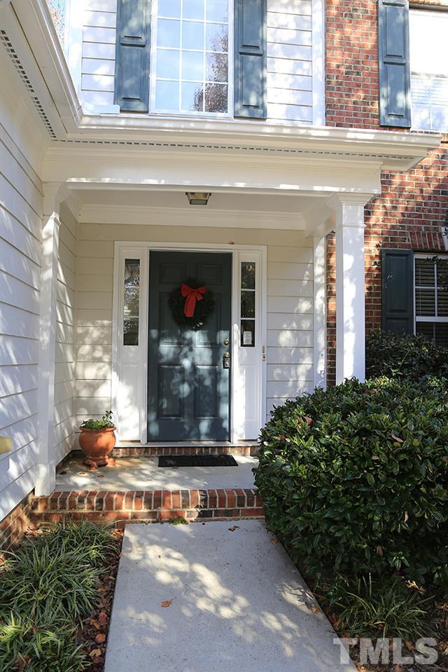 4707 Drewbridge Way Raleigh, NC 27604 - Photo 2 of 28 a view of a building with potted plants