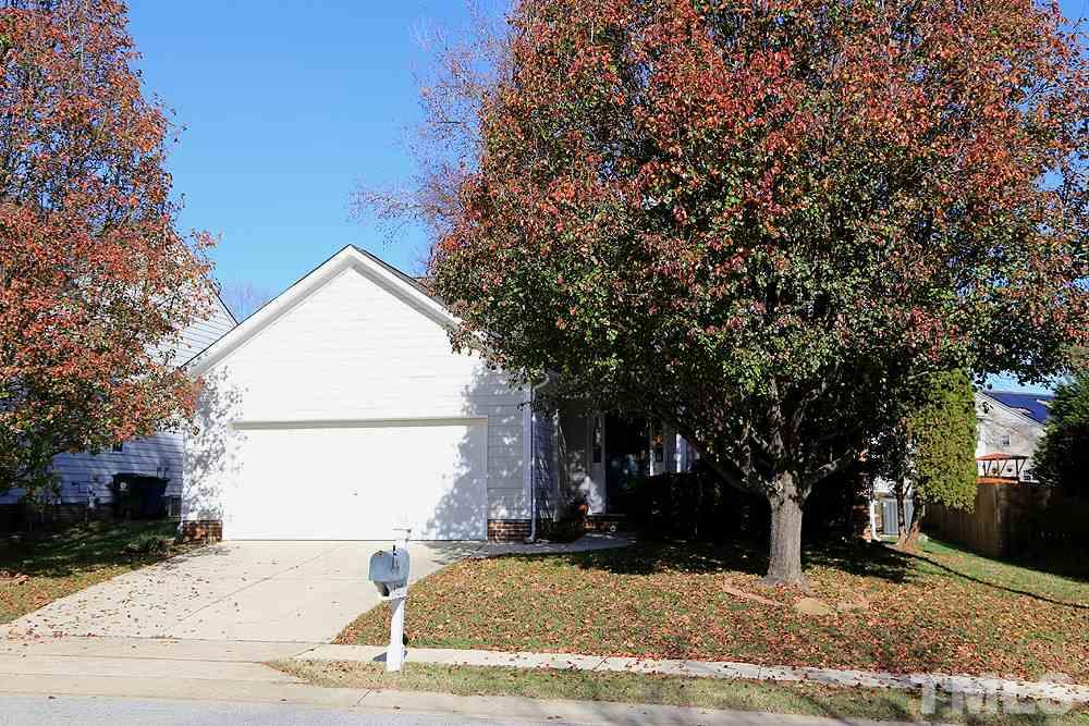 4707 Drewbridge Way Raleigh, NC 27604 - Photo 3 of 28 a view of a house with a yard