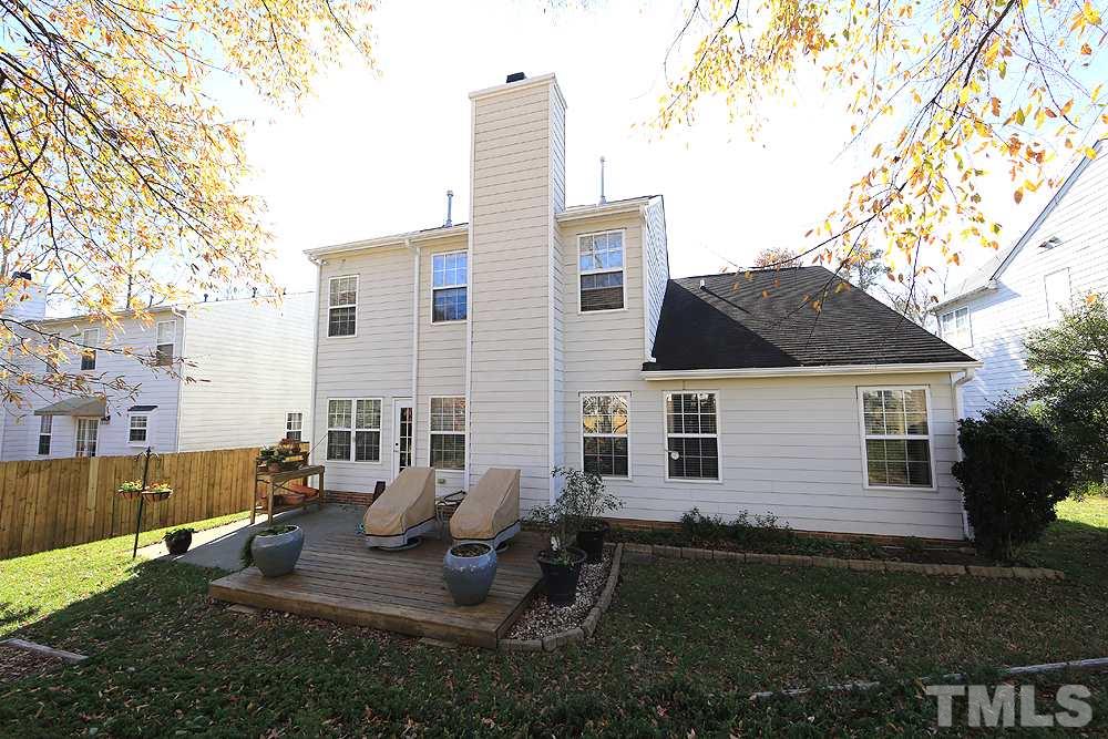4707 Drewbridge Way Raleigh, NC 27604 - Photo 27 of 28 a view of a house with backyard and sitting area