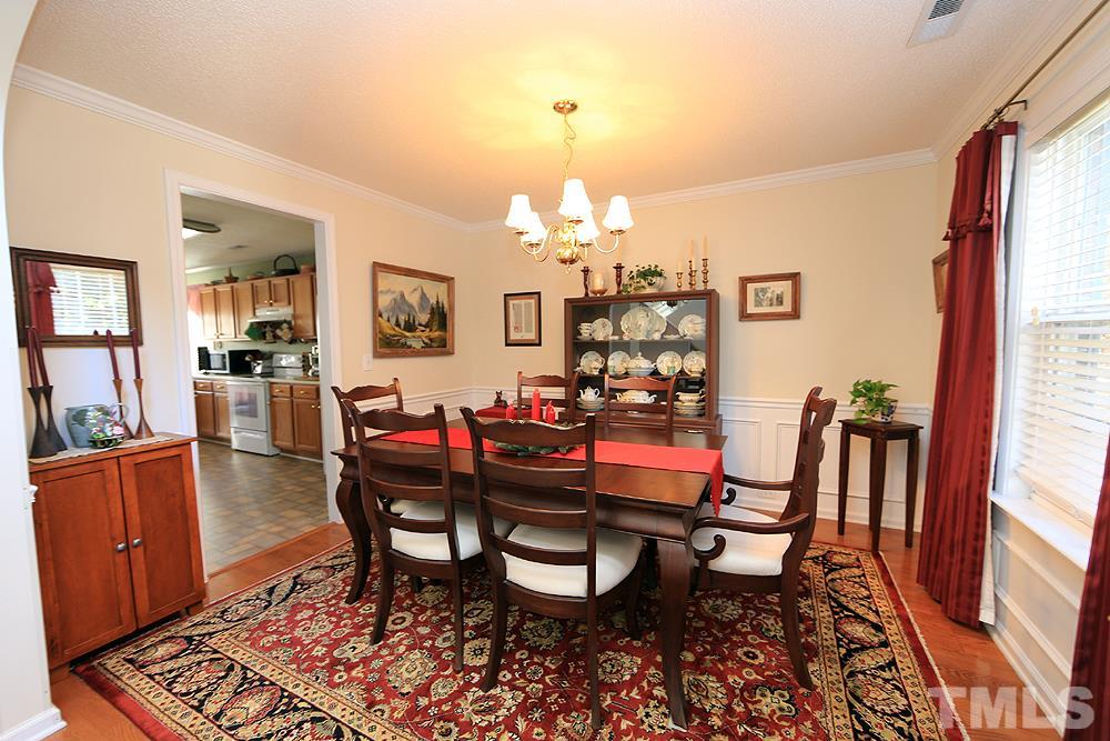 4707 Drewbridge Way Raleigh, NC 27604 - Photo 5 of 28 a dining room with furniture and window
