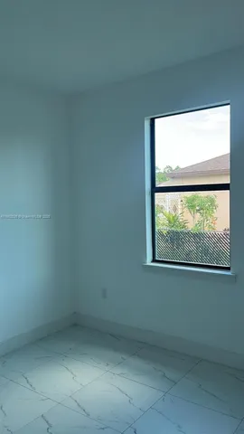 a view of a small space with a window