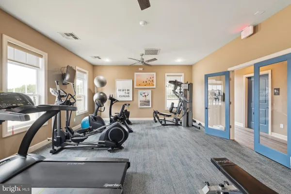 a view of a room with gym equipment