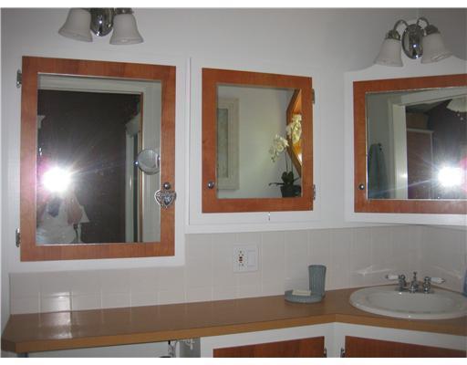 34 Cove Road Lincoln, ME 04457 - Photo 11 of 26 Bathroom. Storage galore in this...