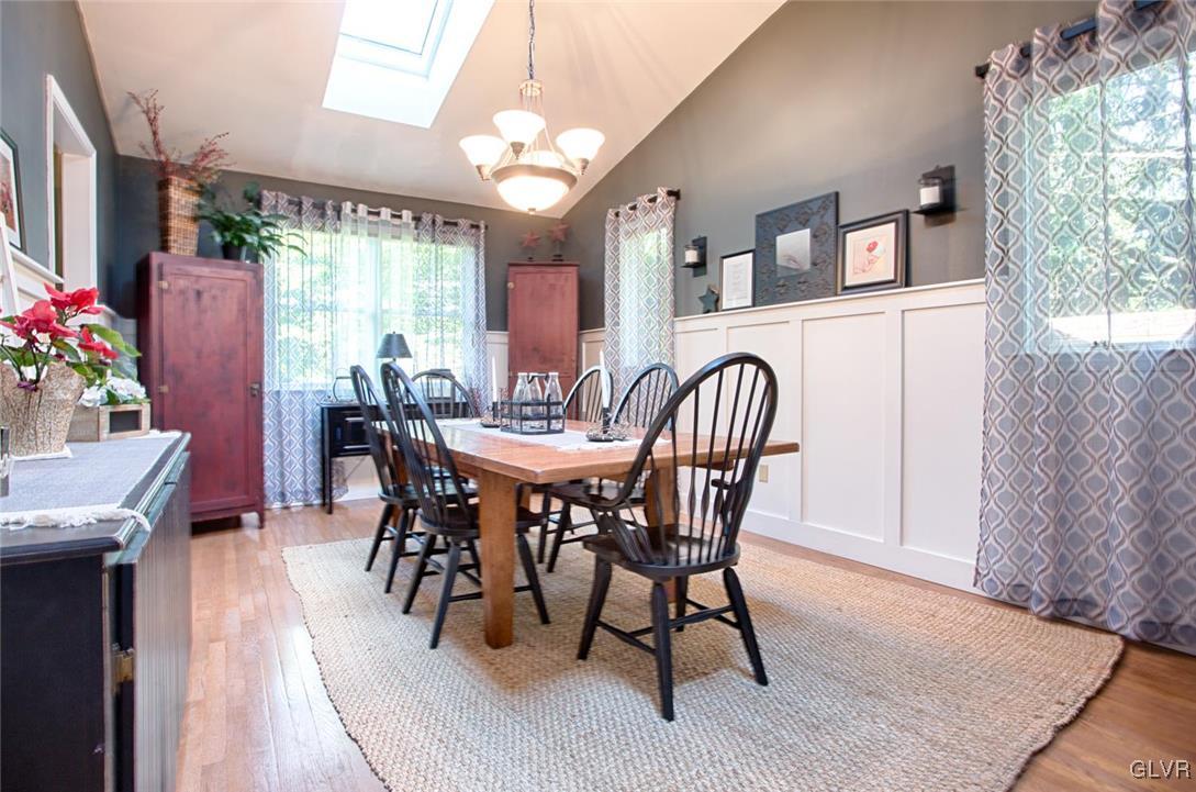 873 Gove Road Nazareth, PA 18064 - Photo 10 of 40 a view of a dining room with furniture and a chandelier