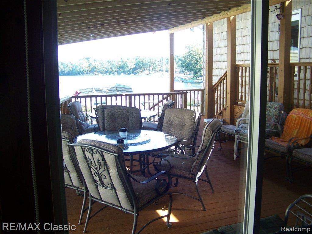 11114 Fernitz Road Byron, MI 48418 - Photo 13 of 17 Gorgeous Covered Deck!