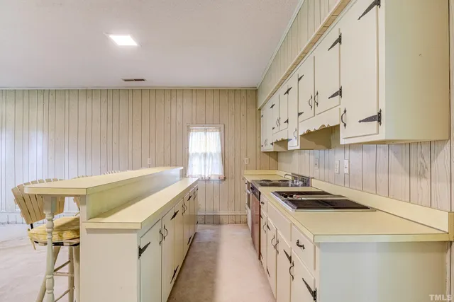 a view of a room with a large window