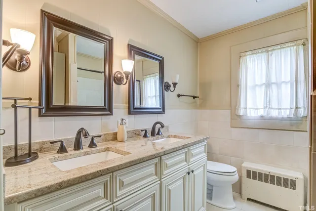 an aerial view of residential house with outdoor space and swimming pool